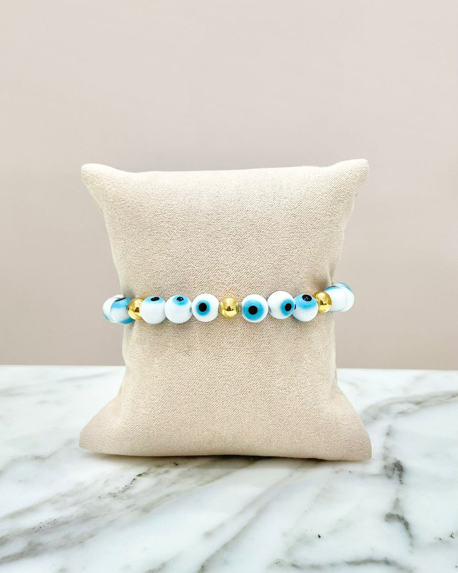 PULSERA BLANCA OJITOS