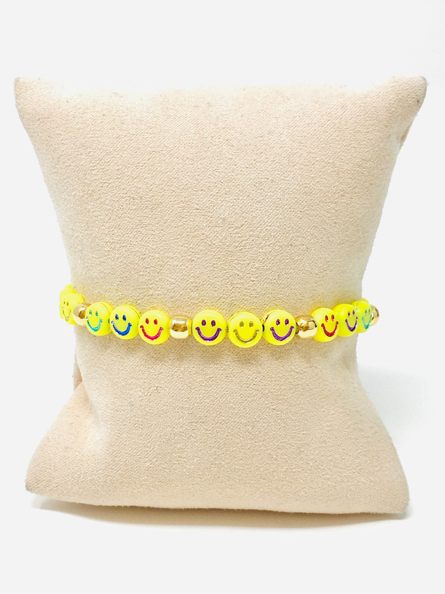 PULSERA CARITA FELIZ BOLITA DORADA